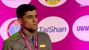 لحظه اهدای مدال طلا در وزن 63kg به ایمان محمدی