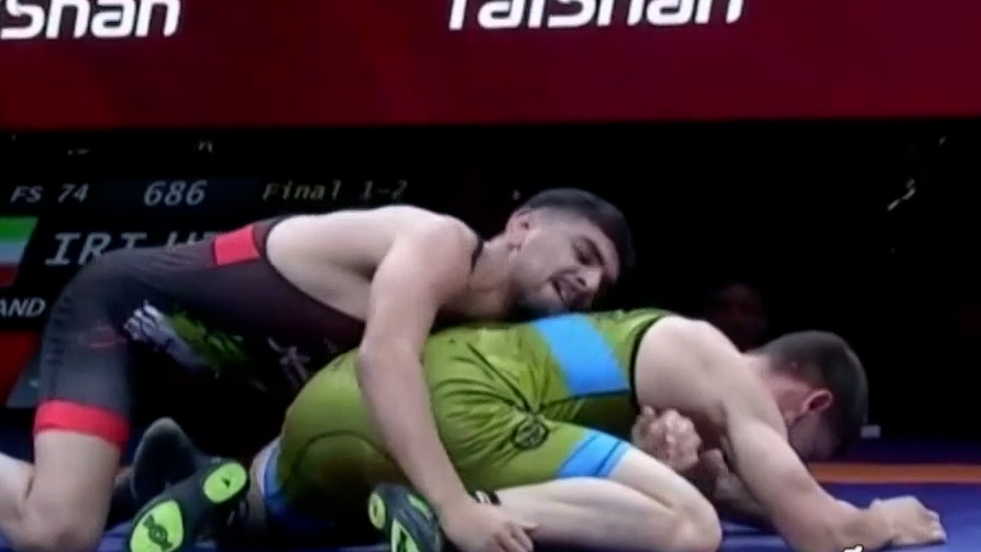 کسب مدال طلا ممیوند در کشتی آزاد وزن 74KG