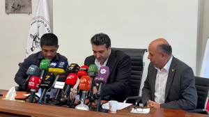 لحظه امضای تفاهم نامه فدراسیون کشتی با دانشگاه آزاد