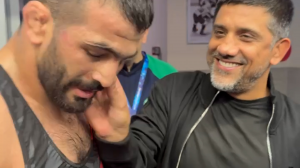 خوش و بش دبیر با یزدانی پس از کسب مدال برنز